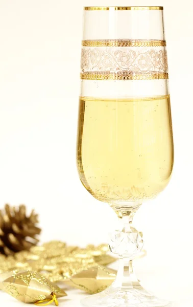 Vintage champagne glass with Christmas decorations — Stock Photo, Image