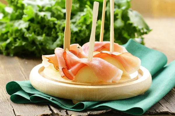 Traditional Italian appetizer, ham Prosciutto with melon — Stock Photo, Image