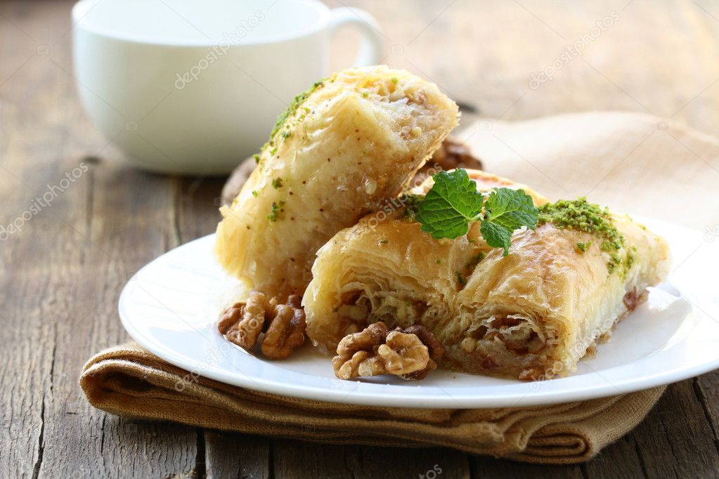 Traditional Turkish arabic dessert - baklava with honey and nuts