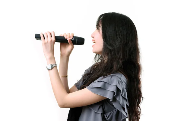 Cantor de karaoke em um fundo branco . — Fotografia de Stock