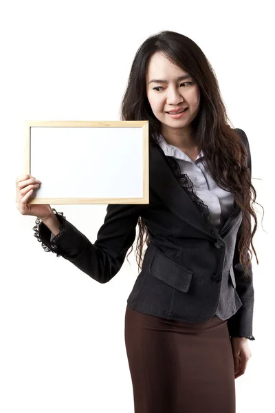 Business woman holding a blank white board — Stock Photo, Image