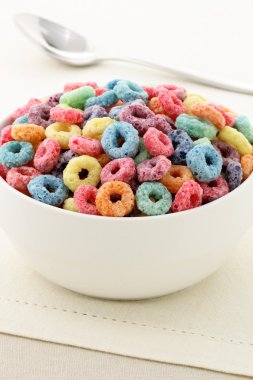 Kids delicious and nutritious cereal loops or fruit cereal clipart