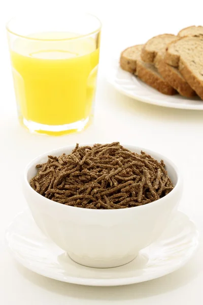 Healthy breakfast with fresh bread and wheat bran cereal — Stock Photo, Image