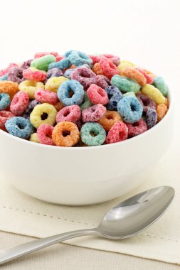 Kids delicious and nutritious cereal loops or fruit cereal clipart