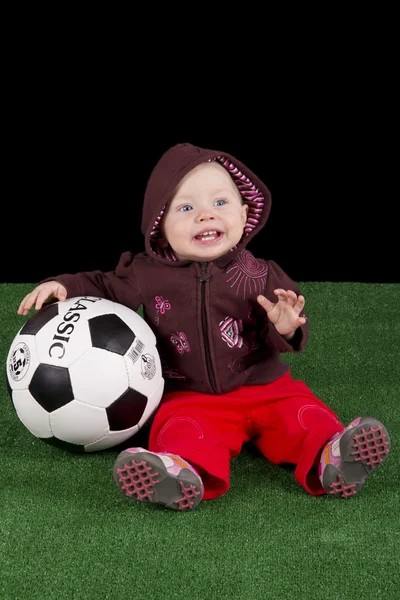 Bambino con un pallone da calcio — Foto Stock
