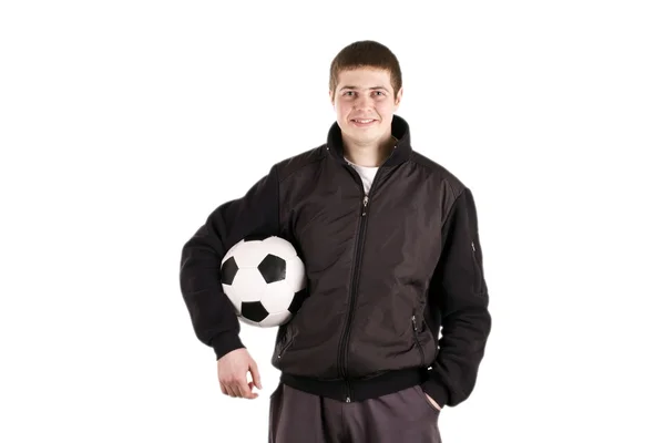 Ung man med en fotboll — Stockfoto