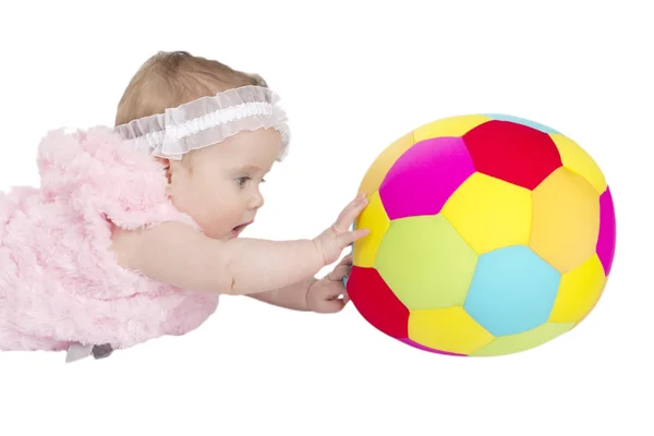 Šťastné dítě hrát si s měkký fotbalový míč — Stock fotografie