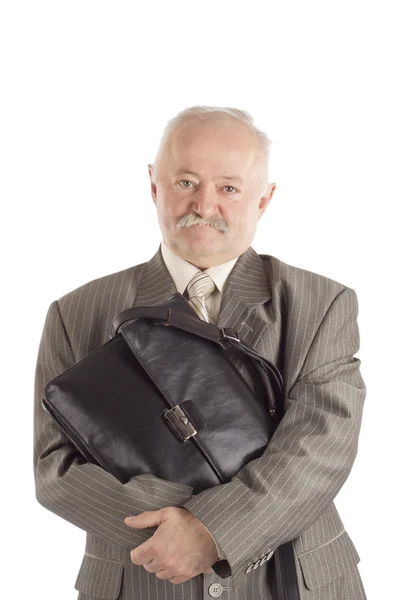 De man met een zwarte lederen tas op een witte achtergrond — Stockfoto