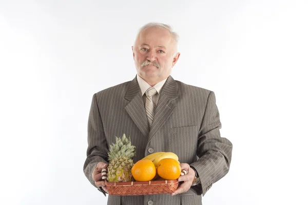 Homem com frutos — Fotografia de Stock