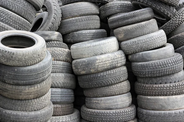Background with old tires on each other — Stock Photo, Image