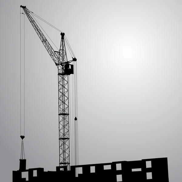 Silhouette eines Krans, der am Gebäude arbeitet — Stockfoto