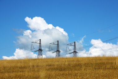 Three electrical towers clipart