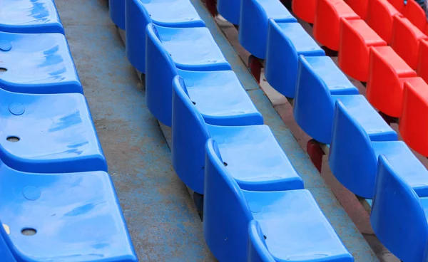 Stock image Empty blue and red stadium seats