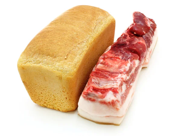 Brood en het grote stuk van vlees — Stockfoto