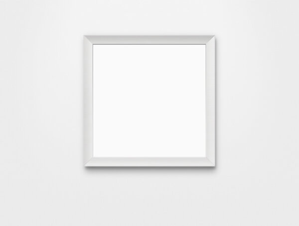 Blank photo frame hanging at the wall with clipping path for the inside