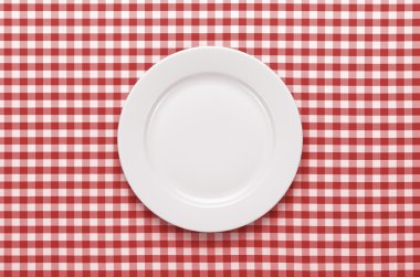 Empty plate at the table clipart