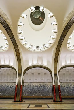 Interior of metro station Mayakovskaya in Moscow clipart