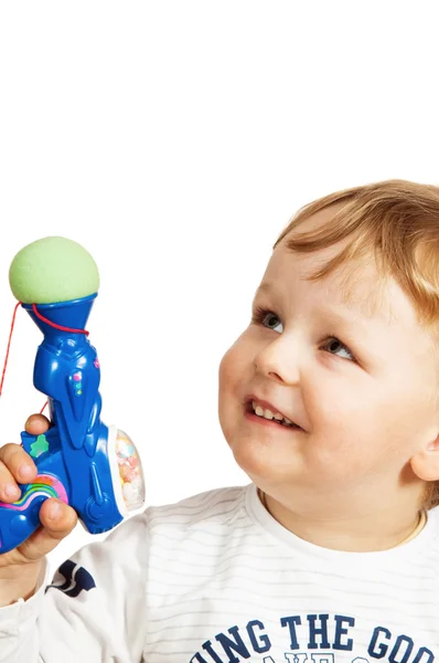 stock image Portrait of the little boy with a toy pistol