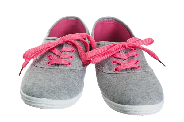 Beautiful female pink sneakers, it is isolated on white — Stock Photo, Image