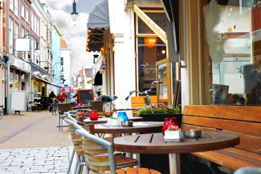 Evening street cafe in Gorinchem. Netherlands clipart