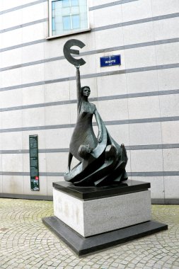 Euro. Statue in front of European Parliament in Brussels. Belgi clipart