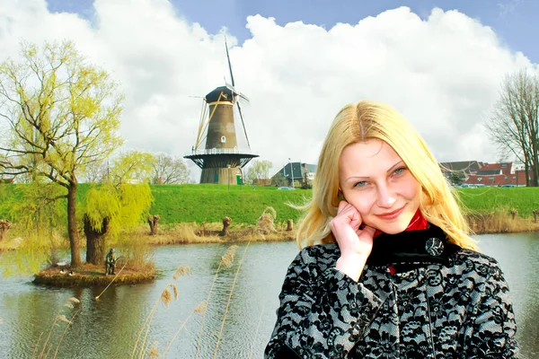 Girl on the waterfront in the Dutch town of Gorinchem. Netherlan — Stock Photo, Image