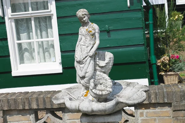 Decorative statue-fountain on the island of Marken. Netherlands — Stock Photo, Image