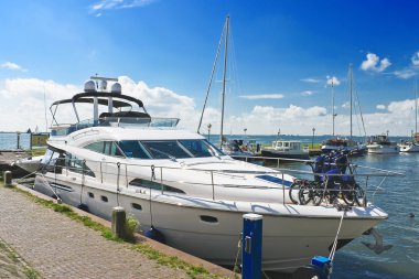 Yachts in the port of Volendam. Netherlands clipart