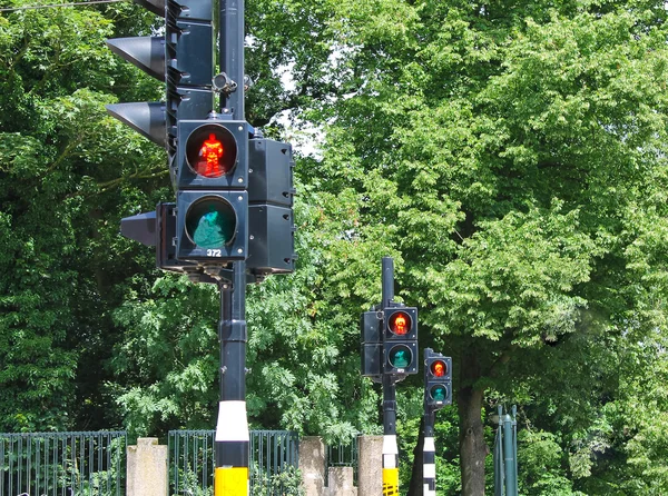 Three red traffic lights in a row — Stock Photo, Image