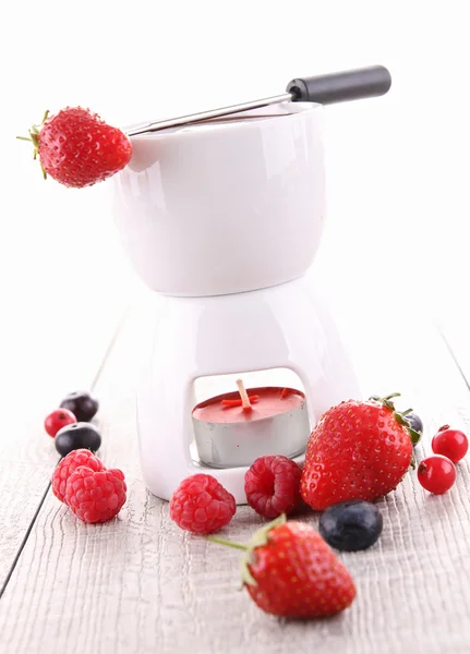 Chocolate fondue with fruits — Stock Photo, Image