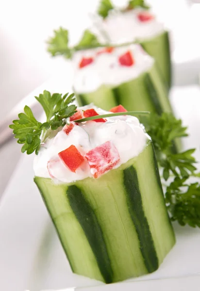 stock image Cucumber garnish with cream and pepper
