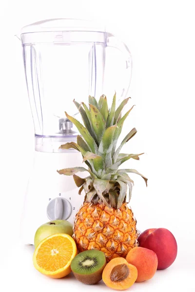 stock image Blender with assortment of fruits