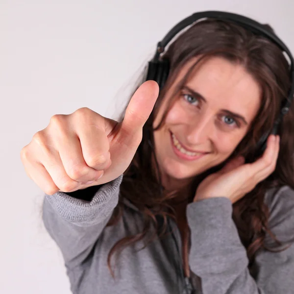 Thumbs up, woman and headphones — Stock Photo, Image