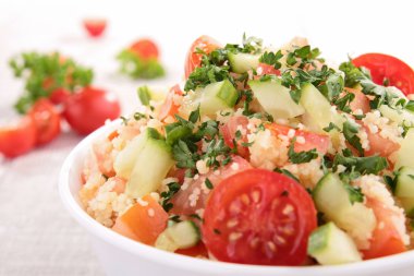 Fresh couscous salad with vegetables clipart