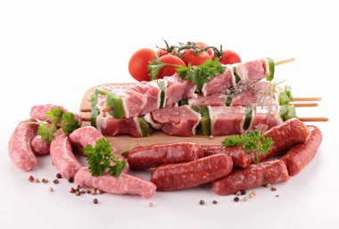 Assortment of raw meats clipart