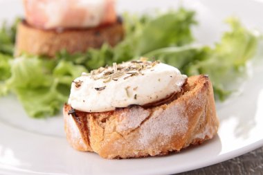 Bread with goat cheese and walnut clipart