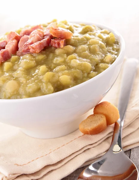 stock image Bowl of split pea soup and bacon