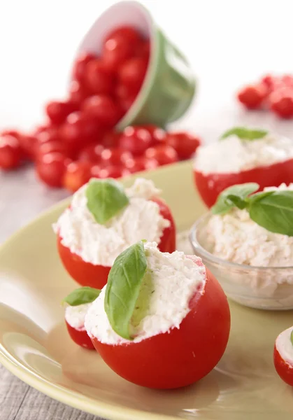 stock image Stuffed cherry tomato with cheese cream