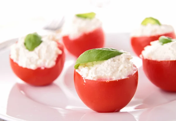 Stuffed cherry tomato with cheese cream — Stock Photo, Image