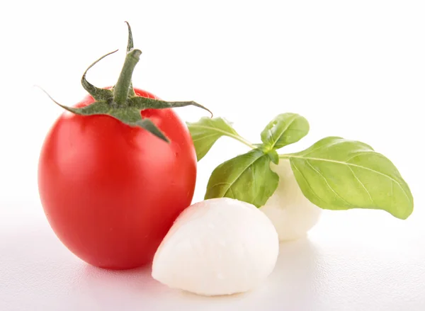 stock image Tomato,mozzarella and basil on white