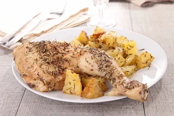 stock image Grilled chicken leg and potato