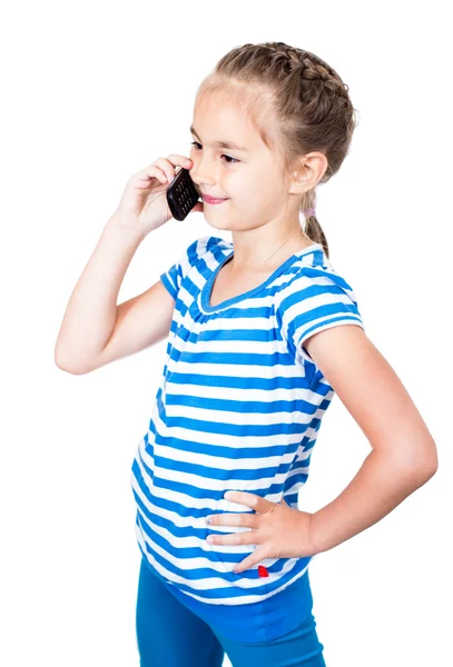 Kleines Mädchen, das per Handy spricht, weißer Hintergrund — Stockfoto