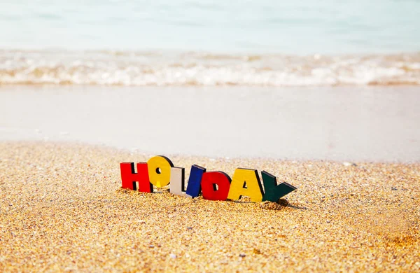 Wooden colorful word 'Holiday' — Stock Photo, Image