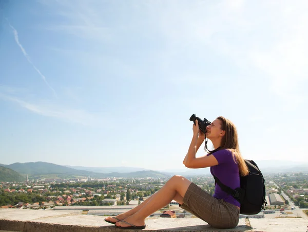 Young lady photographer outdoors — Stock Photo, Image