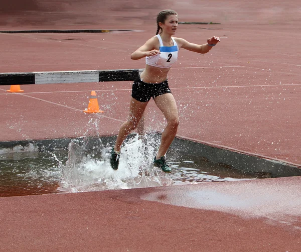 Prokofieva Evgenia competes in the 2000 Meter Steeplechase race — Stock Photo, Image
