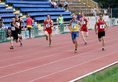 Yalta, Ukraine - May 25: athletes on the international athletic meet between UKRAINE, TURKEY and BELARUS on May 25, 2012 in Yalta, Ukraine. clipart