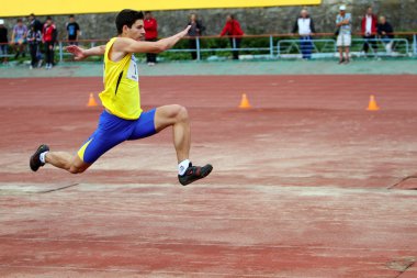 Athlete on the international athletic meet between UKRAINE, TURKEY and BELARUS on May 25, 2012 in Yalta, Ukraine. clipart