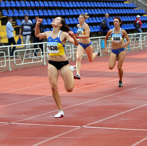 YALTA, UKRAINE - JUNE 01:(L-R) Kolesnichenko Olena, Slusarenko Katerina, Lebed Anastasia compete in the 400 meters race