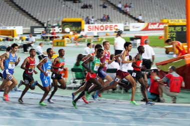 Athletes compete in the 1500 meters final on the 2012 IAAF World Junior Athletics Championships on July 12, 2012 in Barcelona, Spain clipart