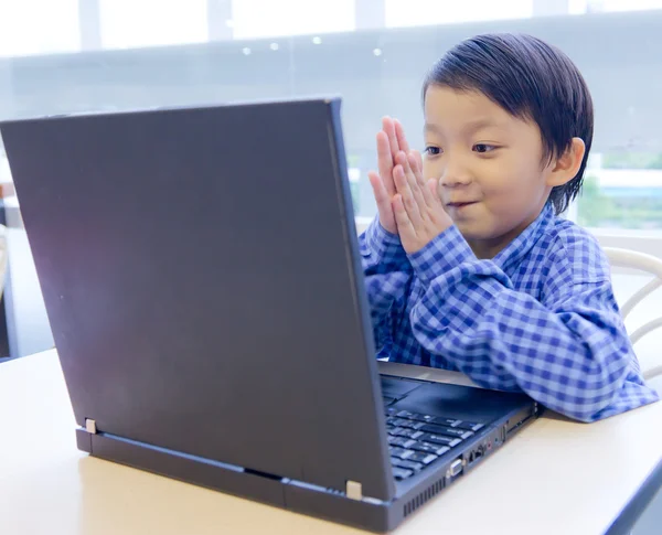 stock image Smile asian kid with laptop notebook